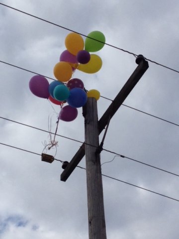 Keep balloons away from power lines if possible to prevent potential outages