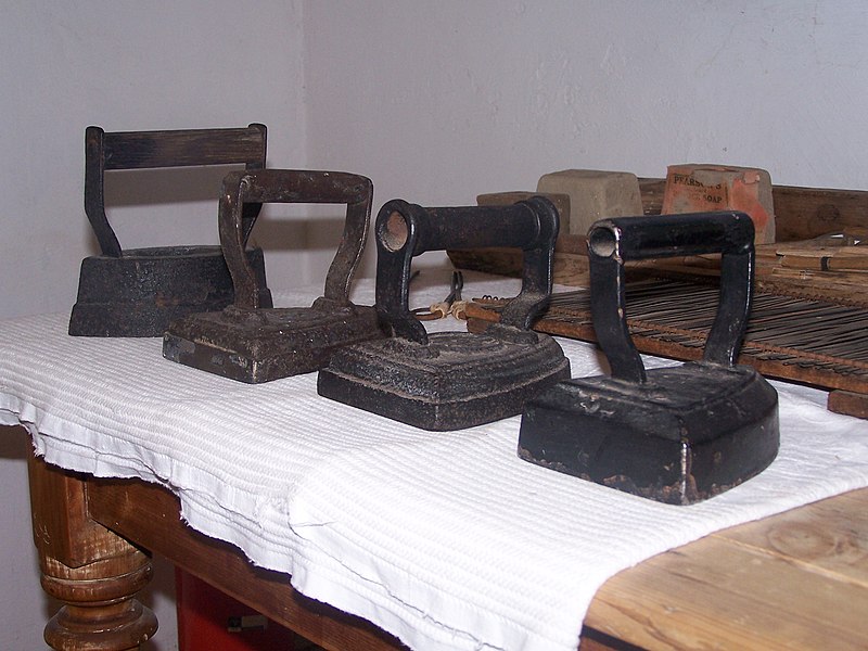 Flat irons commonly used to iron clothing before electric irons were available. Photo Source: Wikipedia