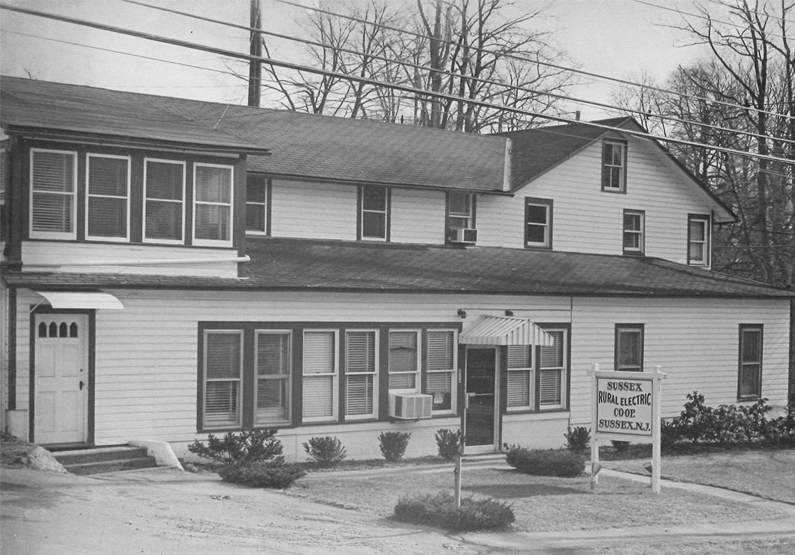 Black-and-white photo of Sussex Rural Electric Cooperative's original office on Main Street in Sussex 