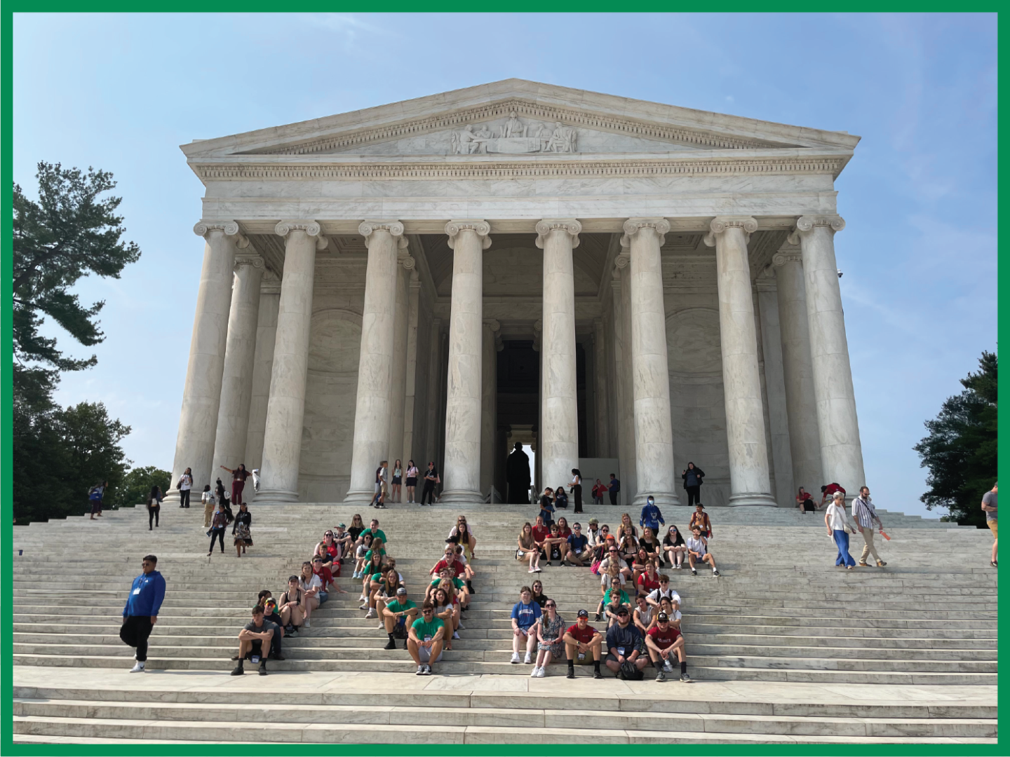 2023 Youth Tour students sit on the steps of the Thomas Jefferson Memorial to spell out "NJ"