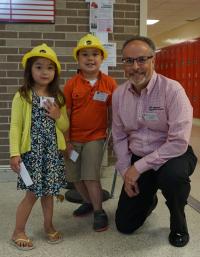 Chris with kids at Annual Meeting